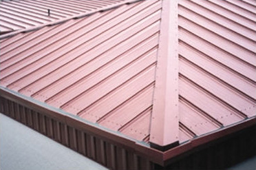 closeup of standing seam metal roof panel on commercial building