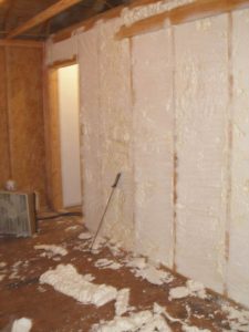Spray foam used to soundproof stairwell walls in residential new construction.