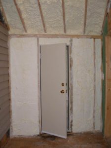 Open cell spray foam in residential addition wall and ceiling cavities.